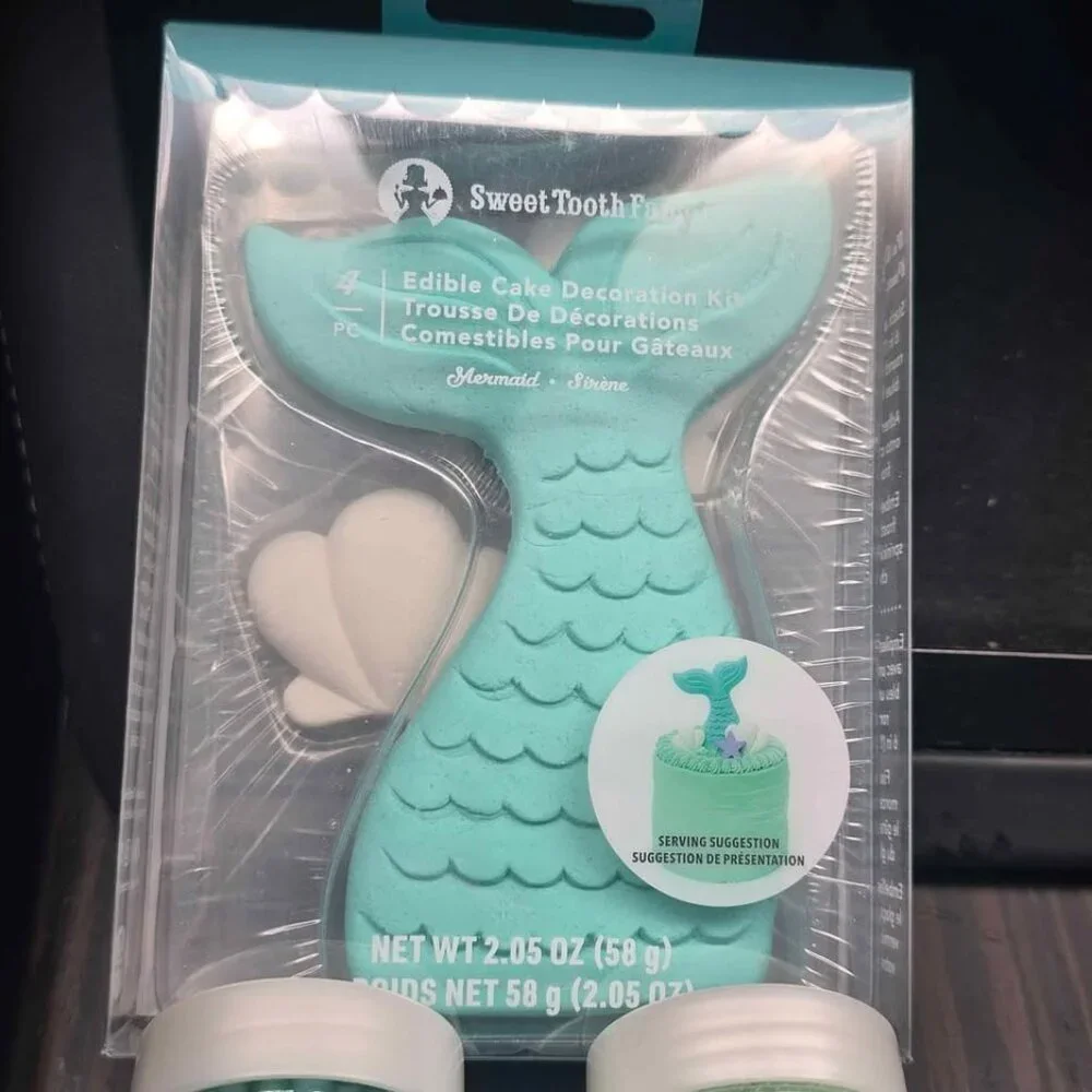 Mermaid birthday cake toppers and sprinkles all new in box unopened. Birthday d